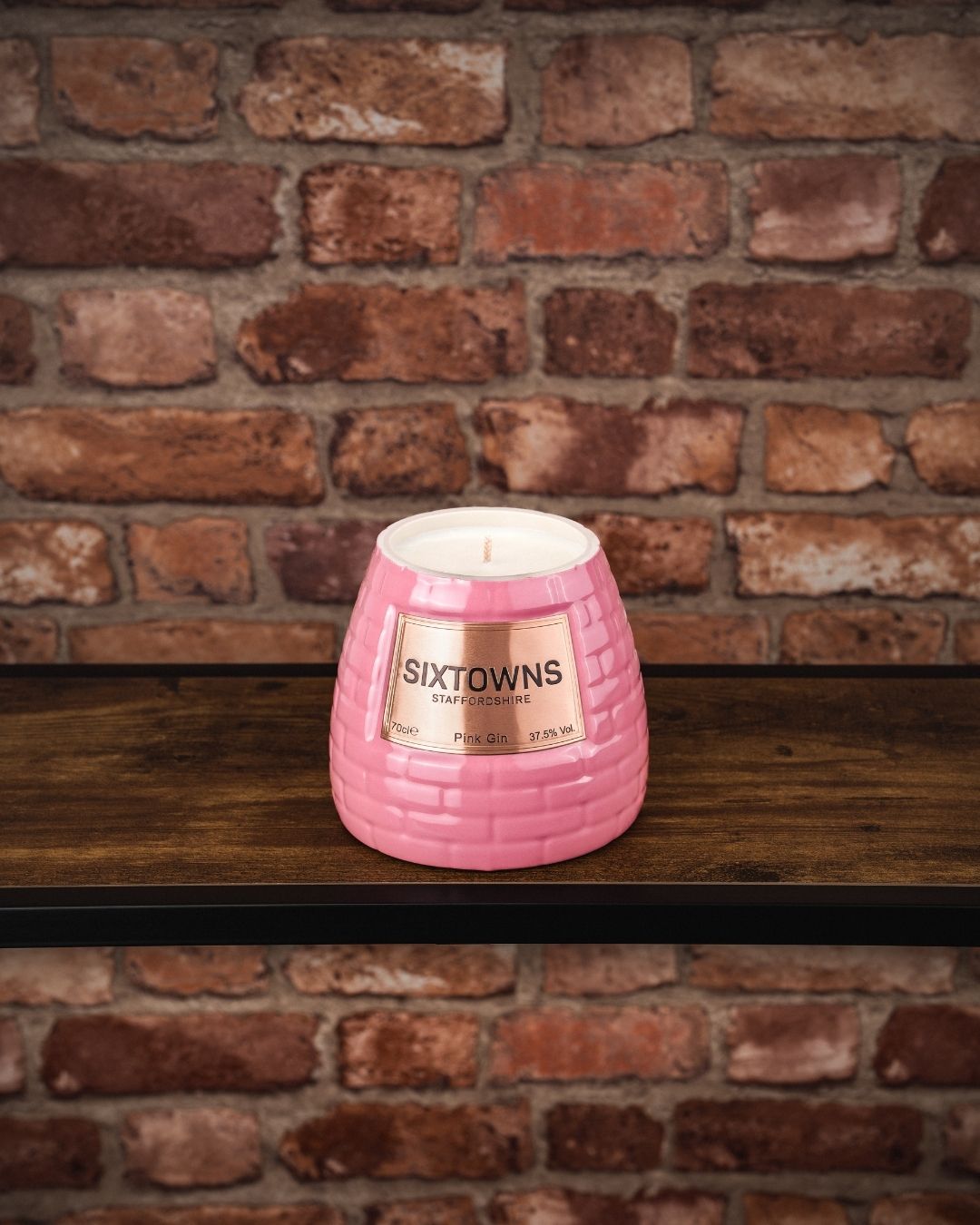SIXTOWNS Pink Gin in soft pink ceramic bottle with Staffordshire branding
